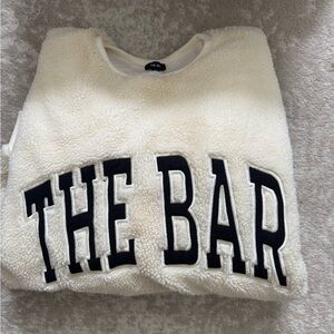 The Bar Cream Sweater with Black Lettering